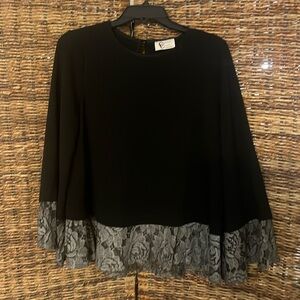 Black ruffle bottom shirt
